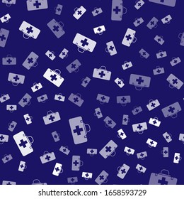 White First aid kit icon isolated seamless pattern on blue background. Medical box with cross. Medical equipment for emergency. Healthcare concept.  Vector Illustration