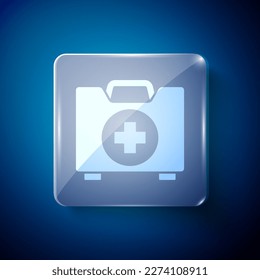 White First aid kit icon isolated on blue background. Medical box with cross. Medical equipment for emergency. Healthcare concept. Square glass panels. Vector Illustration