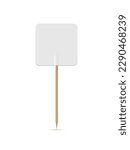 White flag on wooden toothpick. Square paper topper for cake or other food isolated on white background. Blank mockup for advertising and promotions, location mark, map pointer.