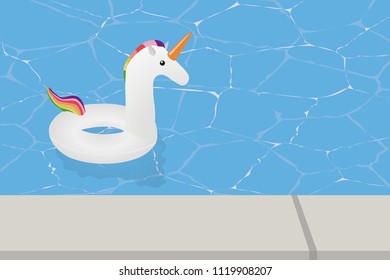 White float in the shape of a unicorn in a pool in summer.