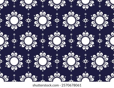 White floral blooming design on dark blue background, ethnic fabric seamless pattern, design for cloth, carpet, batik, wallpaper, wrapping etc.