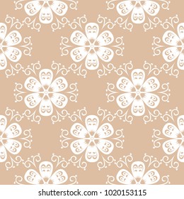 White floral ornament on beige background. Seamless pattern for textile and wallpapers