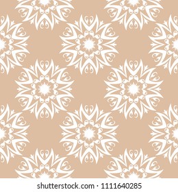 White floral ornament on beige background. Seamless pattern for textile and wallpapers