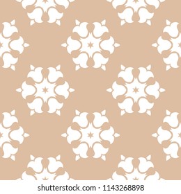 White floral ornament on beige background. Seamless pattern for textile and wallpapers