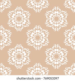 White floral ornament on beige background. Seamless pattern for textile and wallpapers