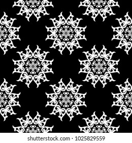 White floral ornament on black background. Seamless pattern for textile and wallpapers