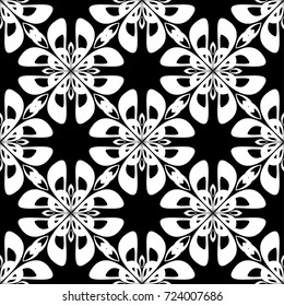 White floral ornament on black background. Seamless pattern for textile and wallpapers