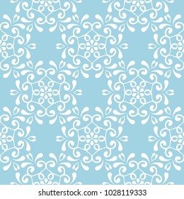 White floral ornament on blue background. Seamless pattern for textile and wallpapers