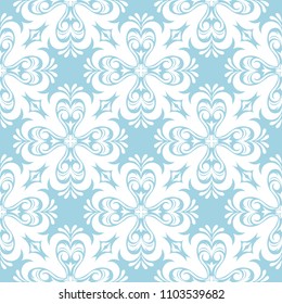White floral ornament on blue background. Seamless pattern for textile and wallpapers