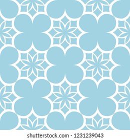 White floral ornament on blue background. Seamless pattern for textile and wallpapers