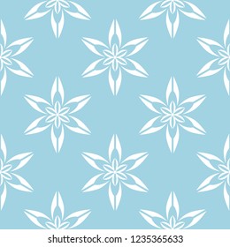 White floral ornament on blue background. Seamless pattern for textile and wallpapers