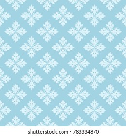 White floral ornament on blue background. Seamless pattern for textile and wallpapers