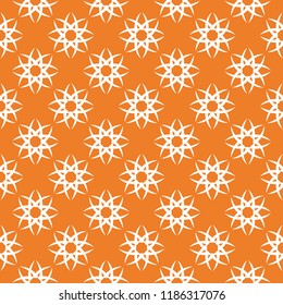 White floral ornament on orange background. Seamless pattern for textile and wallpapers