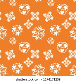 White floral ornament on orange background. Seamless pattern for textile and wallpapers