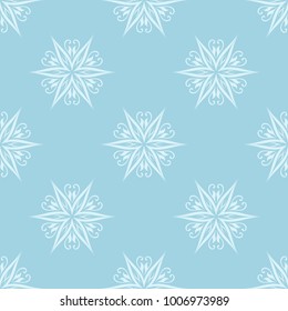 White floral pattern on blue background. Seamless ornament for textile and wallpapers