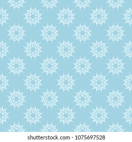 White floral pattern on blue background. Seamless ornament for textile and wallpapers
