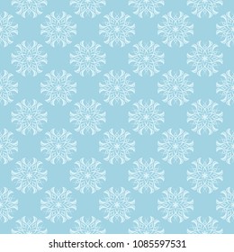White floral pattern on blue background. Seamless ornament for textile and wallpapers