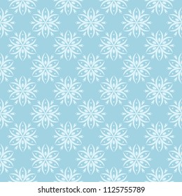 White floral pattern on blue background. Seamless ornament for textile and wallpapers