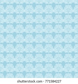 White floral pattern on blue background. Seamless ornament for textile and wallpapers