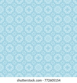 White floral pattern on blue background. Seamless ornament for textile and wallpapers