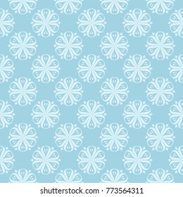 White floral pattern on blue background. Seamless ornament for textile and wallpapers