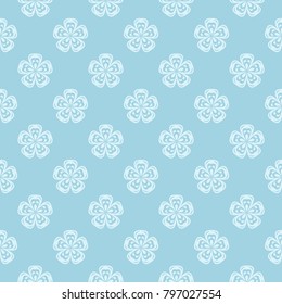 White floral pattern on blue background. Seamless ornament for textile and wallpapers