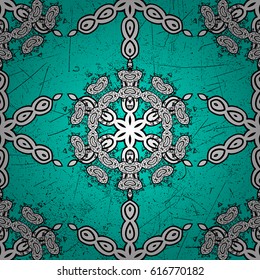 White floral seamless pattern. Damask background. White floral ornament in baroque style. White element on a blue background.