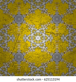 White floral wallpaper. Pattern. Damask background. White element on yellow background. Gray yellow floral ornament in baroque style.