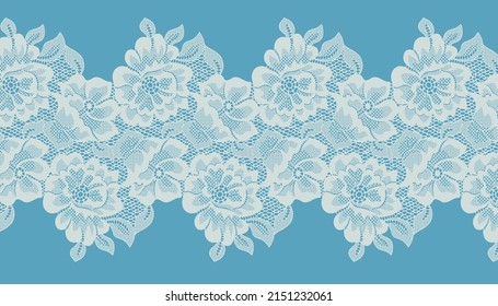 White flower Lace Pattern. Blue Backgrounds.