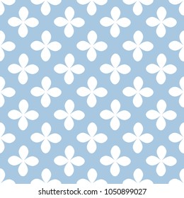 White flower on blue background seamless pattern. Vector background.
