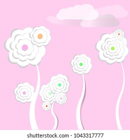 White flower paper on pink background.