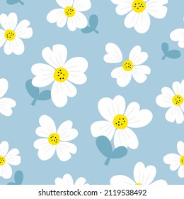 White flower seamless pattern on blue background. Daisy flower pattern 