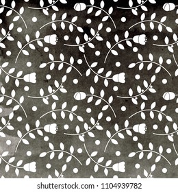White flowers, leaves and branches on the black watercolor background.