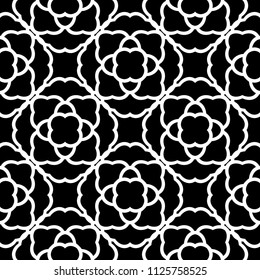 White flowers on black background. Ornamental seamless pattern for textile and wallpapers