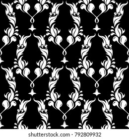 White flowers on black background. Ornamental seamless pattern for textile and wallpapers