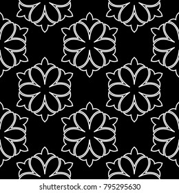 White flowers on black background. Ornamental seamless pattern for textile and wallpapers