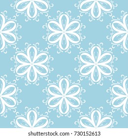 White flowers on blue background. Ornamental seamless pattern for textile and wallpapers