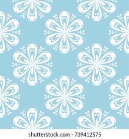 White flowers on blue background. Ornamental seamless pattern for textile and wallpapers