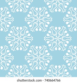 White flowers on blue background. Ornamental seamless pattern for textile and wallpapers