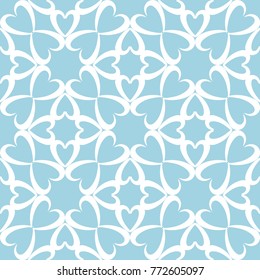 White flowers on blue background. Ornamental seamless pattern for textile and wallpapers