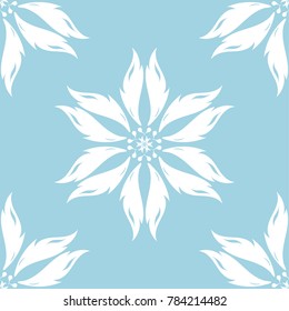 White flowers on blue background. Ornamental seamless pattern for textile and wallpapers