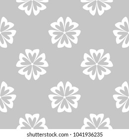 White flowers on gray background. Ornamental seamless pattern for textile and wallpapers