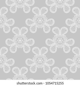 White flowers on gray background. Ornamental seamless pattern for textile and wallpapers
