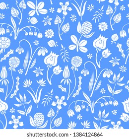 White flowers seamless pattern on blue background.
