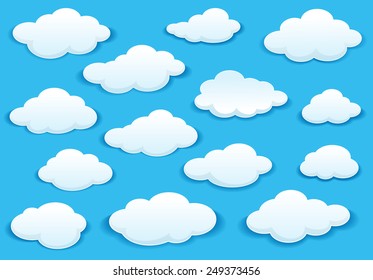 White fluffy cloud icons on a turquoise blue sky in different shapes with a drop shadow