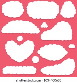 White fluffy clouds on a pink background