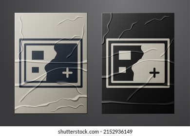 White Folded map icon isolated on crumpled paper background. Paper art style. Vector