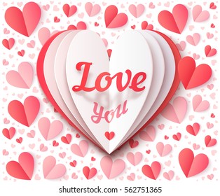 White folded paper heart shape greeting card with Love You sign on red and pink hearts background