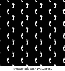 white foot black background seamless pattern