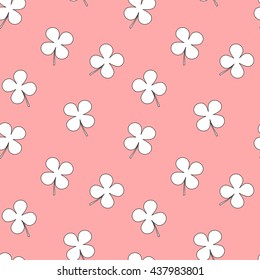 white four leaf clover on pink background seamless vector pattern illustration 